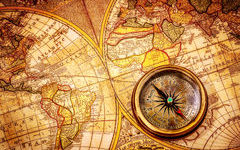 vintage-compass-lies-ancient-world-map-still-life-31239815